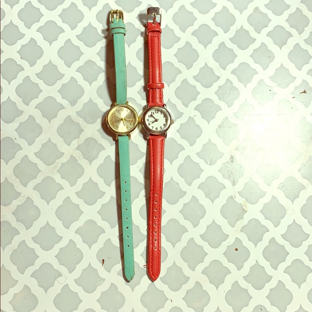 A red watch ⏰and blue watch⏱